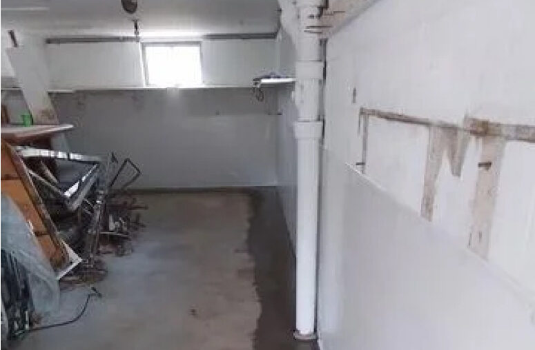 A room full of debris - Big Easy Basements